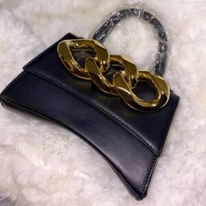 Elegant Satchel Crossbody Black Leather Handbag with Gold Chain Accent